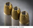 three-9mm-hollow-point-bullets-260nw-591190361.jpg