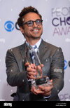actor-robert-downey-jr-appears-backstage-with-his-favorite-movie-actor-award-during-the-39th-a...jpg