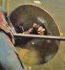 AoU - Cap - SHIELD back - screen cap from trailer 4 - leaning back over rail 2.jpg