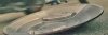 AoU - Cap - SHIELD back - screen cap from trailer 5 - lying on the road.jpg