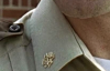 gold collar pin.png