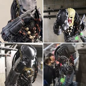 Predator costume with active head tracking by plasma cannon