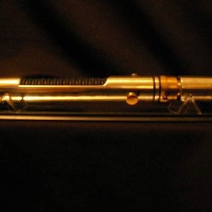 My first saber was fashioned from parts I had around the house.  No elecronics, but it only cost me $3 or $4 to make.