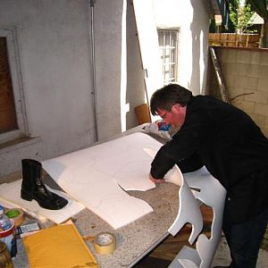Me cutting out the shapes from the large sheets of foam.