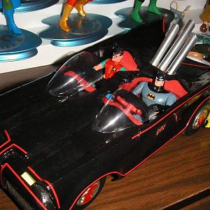 Batman the animated series version BARRIS Batmobile --used the 4 inch figures from BTAS and a Mego Batmobile with new paintjob and decals