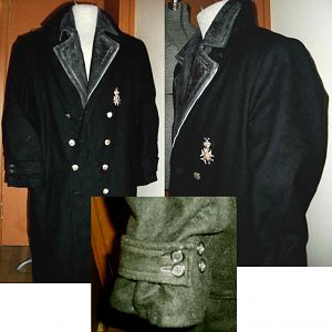 My Lost Boy's David Coat. The medal was also made by me and is Sterling Silver.