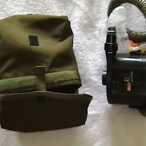 Hose, air pump, and carrier. Pump is necessary for air circulation; a Coleman inflator pump with a remote wire to the switch on the mask. Hose is CPAP