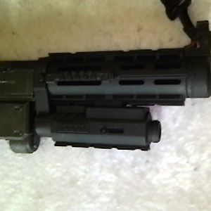 CARB weapon shotgun barrel. Can be removed to make a CARB rifle. Another shot of the red spot/laser designator.