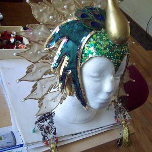 I decided to throw in some pics of the headdress on the mannequin since not all of the pics i took myselk gave a good full view of the whole thing,so