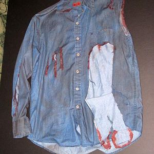 Shirt prop for my Ash costume, bought new and hand torn, dirtied (brown spray paint) and bloodied with fake blood.