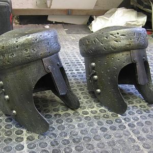 There made out of L-200 foam.  Coated with black rubber latex, then dry brush painted.