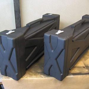 The cases were made out 1" and 1/2 black L-200, then spray coated with black ballon rubber latex.