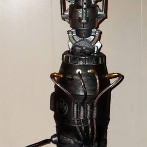 My Borg arm, the 1st part I made. The end of the arm is articulated and moves by the use of marionette style cords. It really freaks people out. ;)