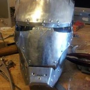 The helmet still needs alot of work, the face plate is just sitting on the helmet