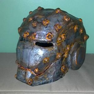 A very rusty Iron Man helmet