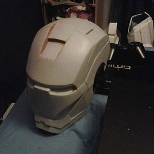 The foam cardboard helmet coated in resin and some body filler after hours of sanding now ready for silicone moulding.