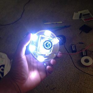 Not officially part of my suit. This was a super quick rough draft Arc reactor made out of LED's and a Yankee Candle Lid. I needed to put something to