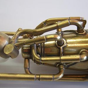 Whisperer 2. Brass tube, cast urethane with electro-plating, vac-formed clear plastic, laser-cut acrylic