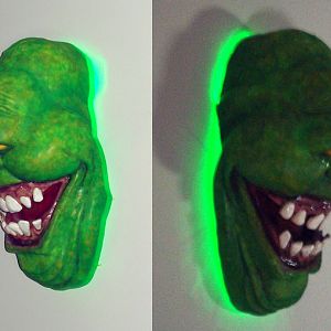 Slimer is backlit by a series of 4 hyperbright green LEDs giving him that 'phasing through wall' look.