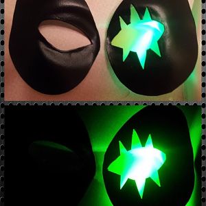 Then we made a couple of eye pieces from rubber and placed an LED in one of them