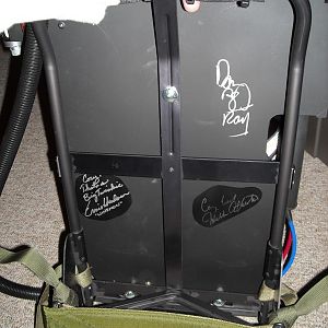 Proton Pack is autographed by Dan Aykroyd, Ernie Hudson, and William Atherton.