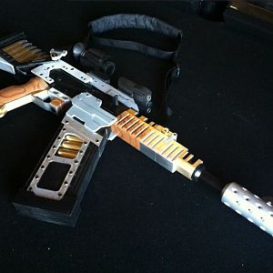 I call her, "Vera."
3D printed elements, a hacked up airsoft AK, and various other components make this prop.