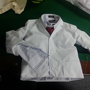 Toddler lab-coat, dress shirt, and red tie stitched together.