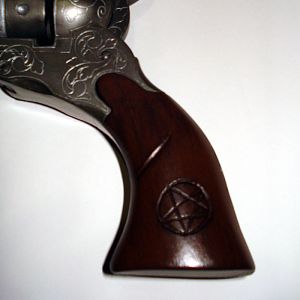 The Colt, closer up on the grip carvings.