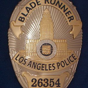 Blade Runner

Full sized metal badge based on the LAPD Badges,
was never shown in the movie but is one of the most wanted Blade Runner collectibles