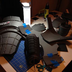 Pieces of the torso and arms being worked on.