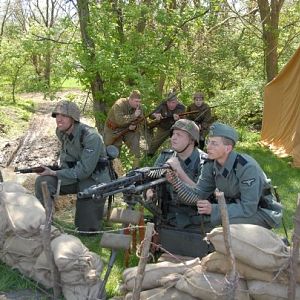 My day's with the a  Waffen-SS group, that's a live MG42 on the laftette tripod.
Had lots of fun with it at this event.