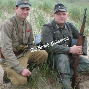 With my buddy and reenacting mentor Rick at the D-Day landing 2009. He had switched kits for the Pacific landing staged after the D-Day landing.