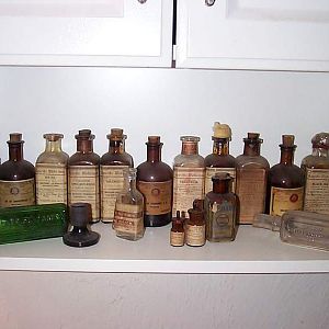 Antique Specific Medicines, many full with boxes.