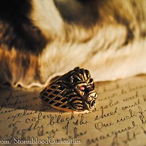 House Lannister, Game of Thrones inspired Sigil Ring with ruby crystal eyes.