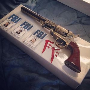 Bought a colt replica (just need to change the handle and such), some little FBI cards and my "Mark of Cain" temp tattoos arrived to go along with my
