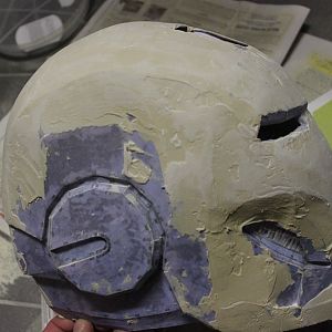 sideview of the Ironman Mark IV helmet with some coats of bondo and sanding