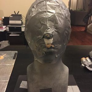 Covering the entire head with tape