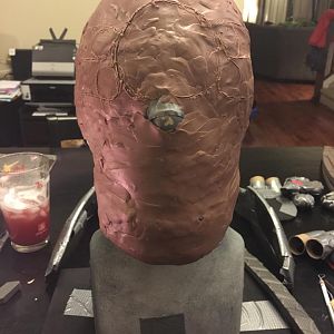 Adding clay and mapping out the areas where the "eyes" will go. I'm still not sure how he is going to see out of this helmet!
