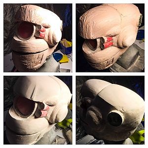 Briareos update: I got impatient and used bondo. The other epoxy was taking too long so I found my respirator and got to work! Bondo is reddish (top p