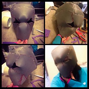 Here I am, I have cut out, and glued the peices for my Red Hood helmet out of Eva foam. This was free handed.