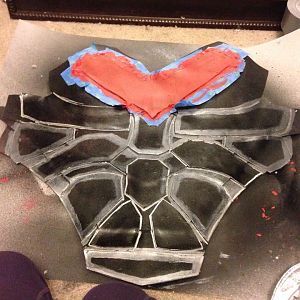 Here is my front armor, sectioned off, as I am detail painting. I used painters tape to section off as I added detailed paint.