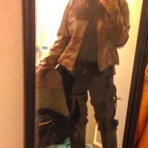 Here is a photo of the black cargo pants and brown pleather jacket I found on eBay