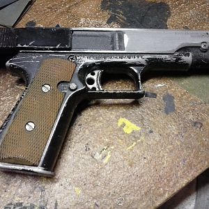 I wasn't happy with the black finish, so I began polishing the BB gun down to it's cast metal finish.