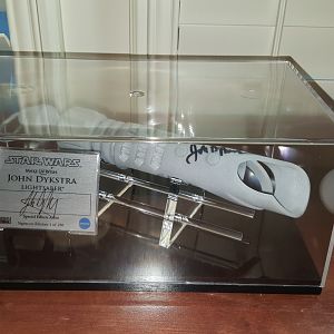 3D-Printed resin lightsaber signed by John Dykstra from the Star Wars Skywalker Ranch Omaze campaign. Only 250 of these were given out to donators. I
