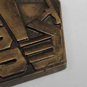 Dredd badge close up