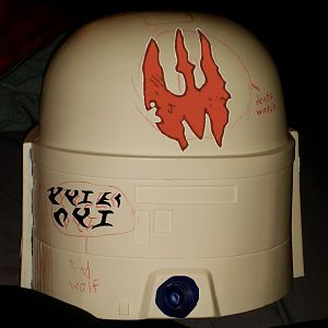 Back of mandalorian helmet. Bad wolf klingon, death watch symbol, probic vent sontaran's