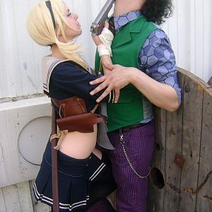 Me with my bf at the November con in Argentina. Jocker got busted, lol.