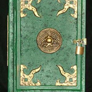 A cthulian eldrich tome with resin appointments. Static prop, exterior only. (sold)