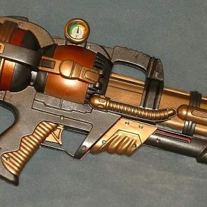 A steampunk raygun prop made from a cheap water pistol. (sold)