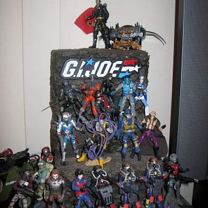 G.I. JOE Display
Made to house the G.I. JOE Logo from the Collectors 5-pack
Made of wood, carved foam blocks, wood putty and loads of paint and agin